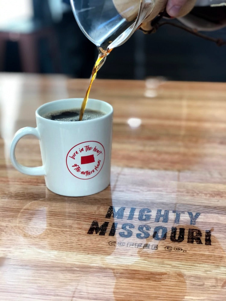 
                  
                    Born in the Heart of the Northern Plains Mug Mighty Missouri Coffee Co. 
                  
                